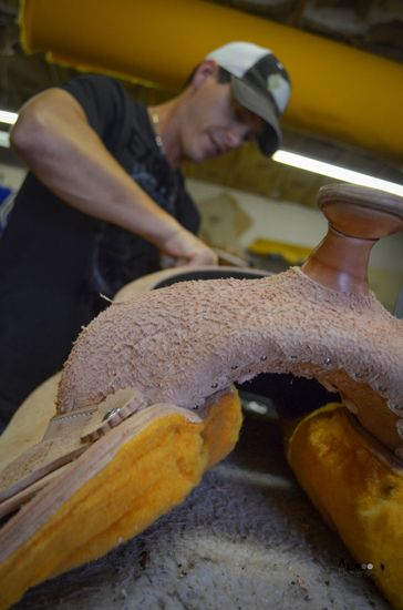 Joey Wenger crafting a work saddle