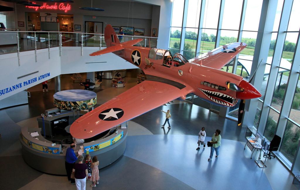suzanne-parishs-pink-curtiss-p-40-warhawk-hangs-in-the-lobby-of-the-air-zoo-baac1176f4ee7716-1024x649