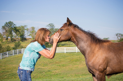 Susan Knapp with foals