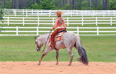 Jan Pittman riding VS Code Blue.