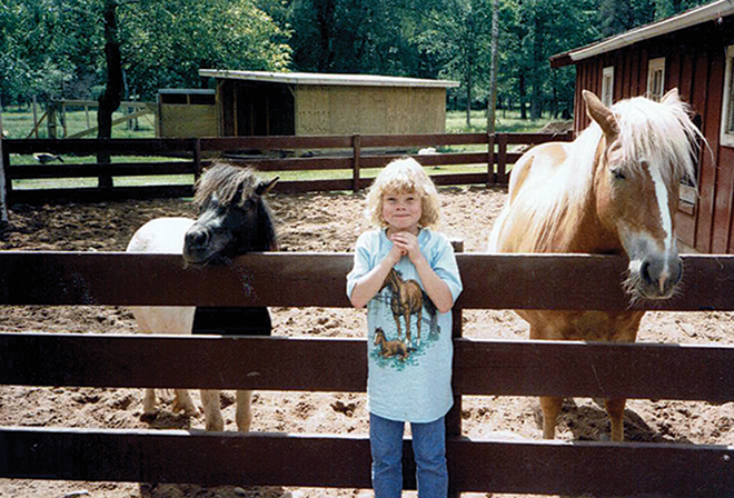 Ann as a kid with horses