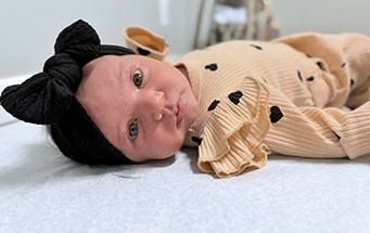 Raina & Erik Parsons add to family